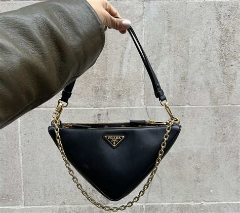 prada triangle bag symbole|prada triangle bag dupe.